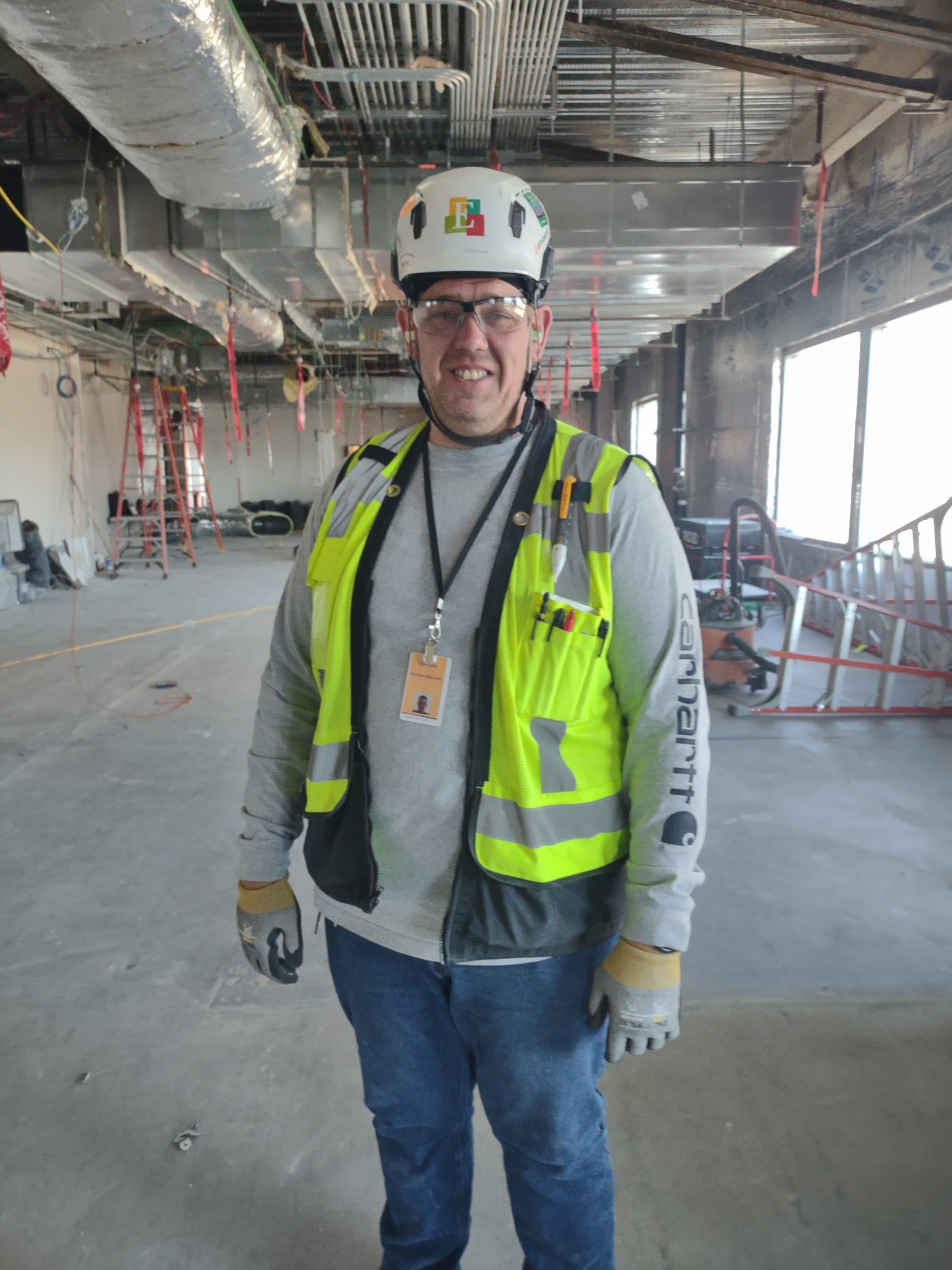 Photo of Richard Allsbrook on an Encore Electric project site.