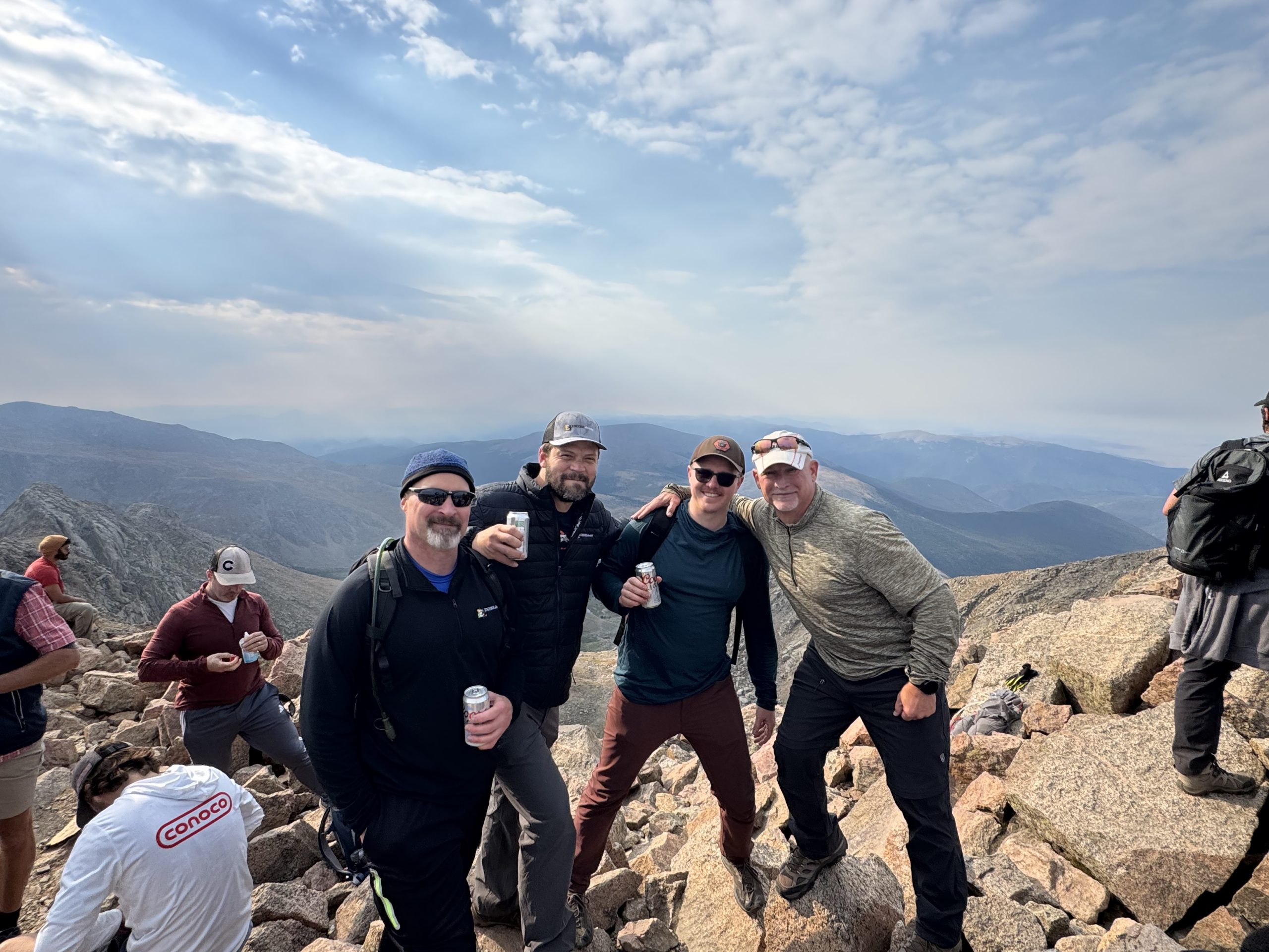 Photo of Rohr, Director of Denver Construction Tim Cohn, Engelstad, and Executive Vice President Marlin Linder at 2025 Climbing for Kids Event. 